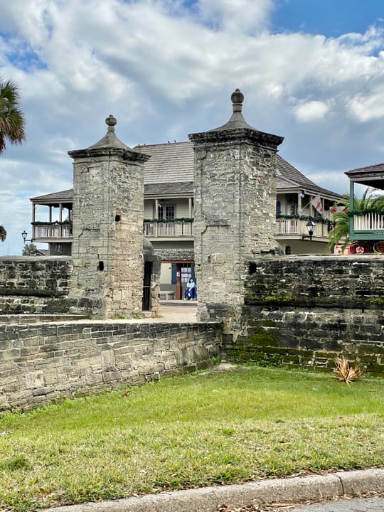 Erected in 1808 during the Second Spanish Period, the coquina pillars of the Old City Gate was built when the Cubo line of fortifications was reconstructed on the northern flank of the colonial city, running west from the adjacent Castillo San Marcos.  The gate survived redevelopment of the surround