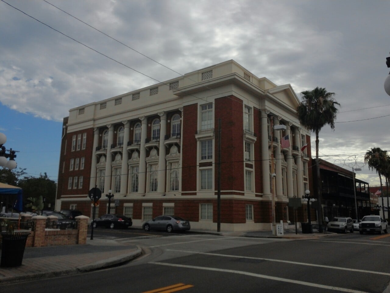 Exterior facade of L'Unione Italiana (The Italian Club of Tampa), a 1918 Renaissance Revival clubhouse on 7th Avenue in Ybor City with marble columns and grand entrance.