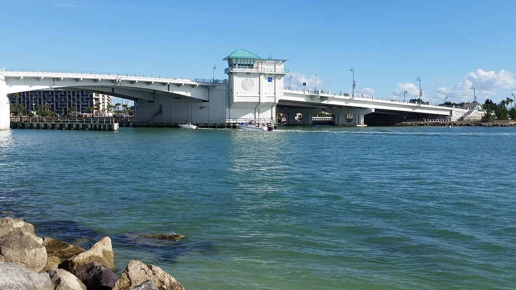 John's Pass bridge crossing between Treasure Island and Madeira Beach Florida at sunset