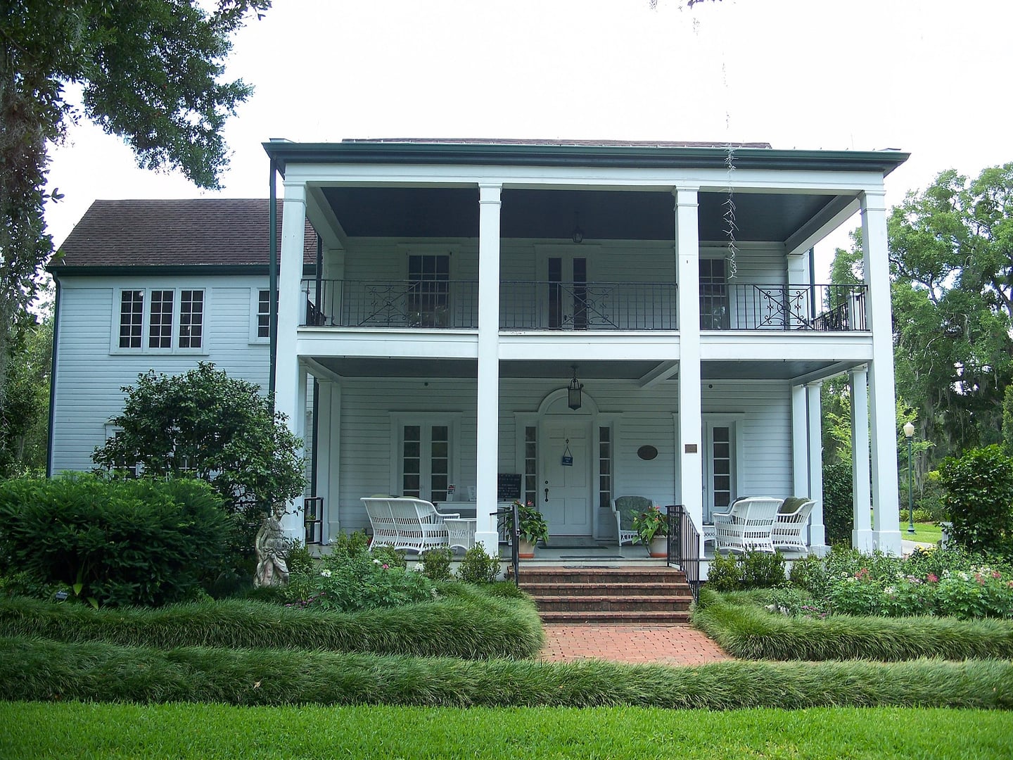The Mizell-Leu House historic building at Harry P. Leu Gardens, Orlando, Florida, a National Register property surrounded by landscaped grounds