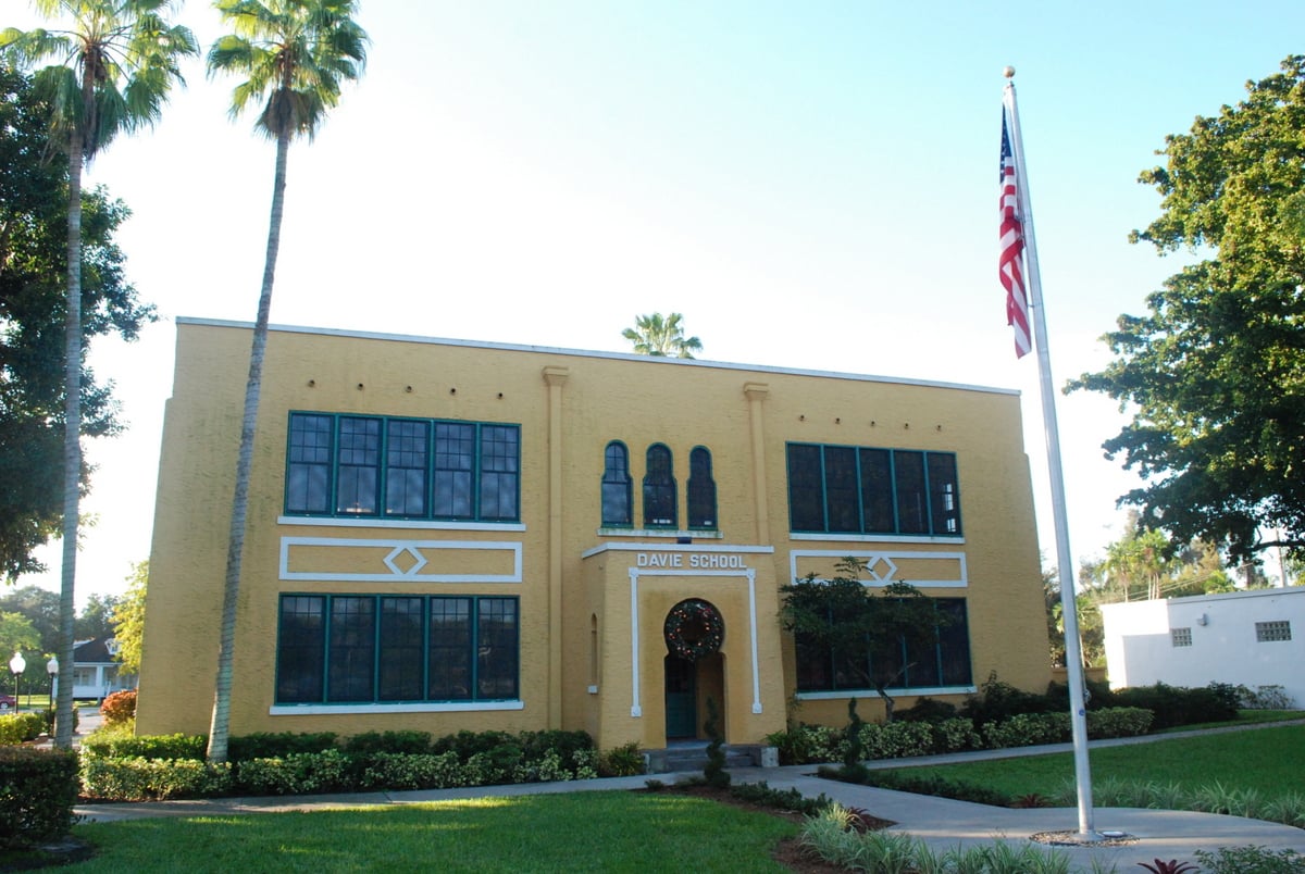 Exterior of the Old Davie School, a two-story 1918 historic building listed on the National Register of Historic Places in Davie, Florida