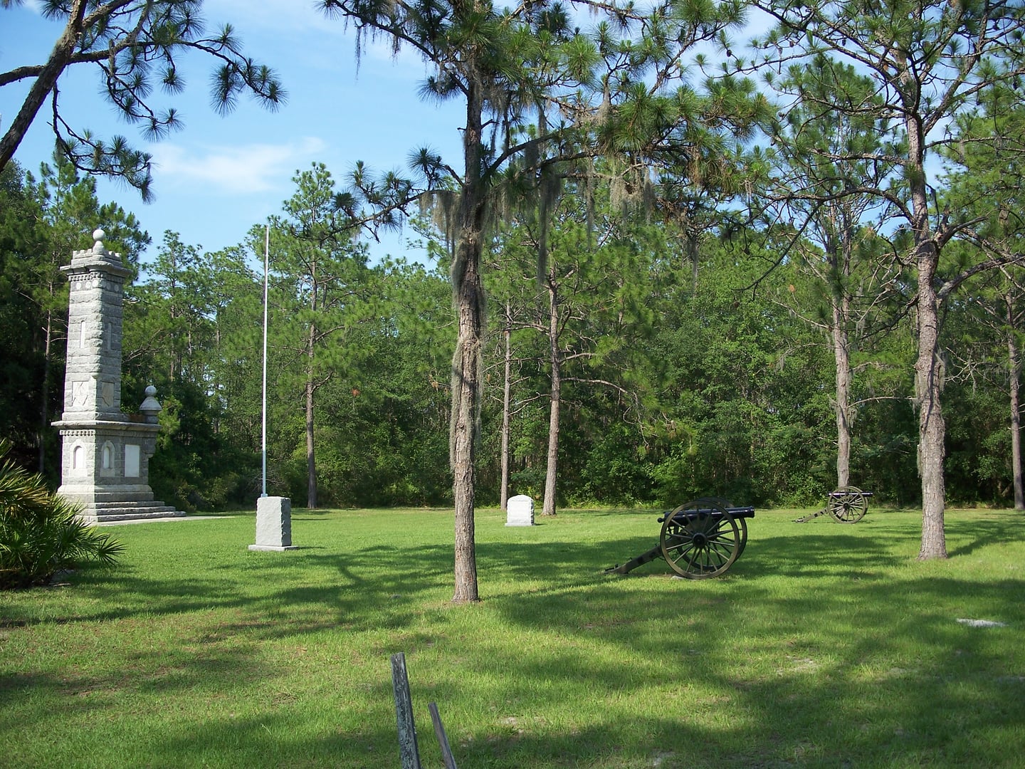 The granite Confederate monument and open battlefield at Olustee Battlefield Historic State Park, Baker County, Florida