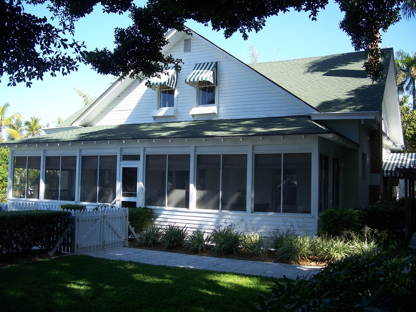 Exterior of Palm Cottage, Naples, Florida, showing the historic tabby mortar construction