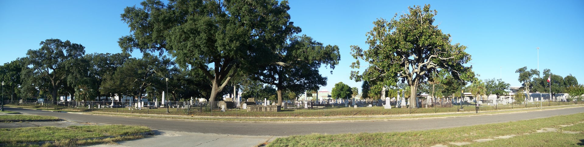 Panoramic view of historic above-ground tombs at St. Michael's Cemetery in Pensacola, Florida