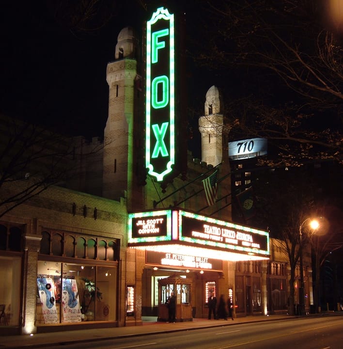 The Fox Theatre's illuminated "FOX" vertical sign and marquee at night, Atlanta, 2005.