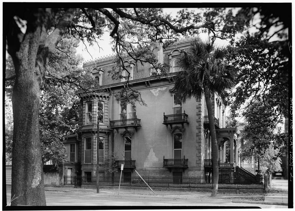 The Hamilton-Turner house (Samuel P. Hamilton House) at 330 Abercorn Street in Savannah, seen from the north side and front in a June 1966 Historic American Buildings Survey photograph, with a palm and a live oak in front of its mansard roof and corn