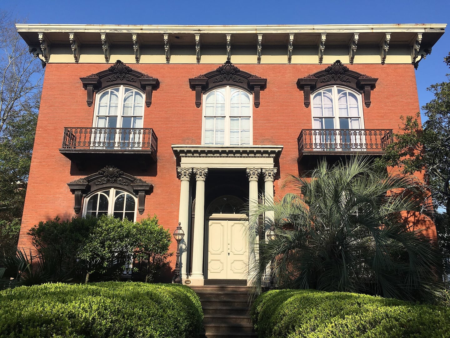 The Mercer-Williams House at 429 Bull Street in Savannah, Georgia, an 1860s Italianate mansion made famous by 'Midnight in the Garden of Good and Evil.'
