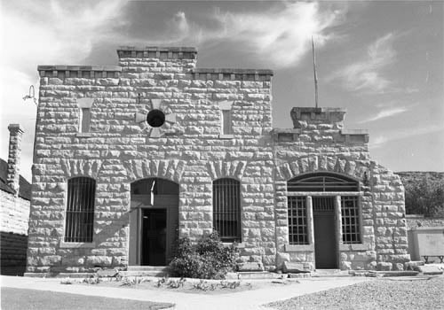 Sandstone facade of the Old Idaho State Penitentiary, the historic territorial prison in Boise, Idaho