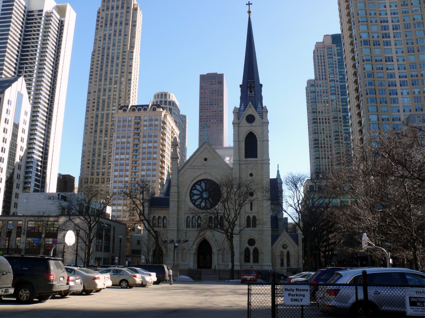 Exterior facade of Holy Name Cathedral on State Street in Chicago, showing the Gothic Revival stonework