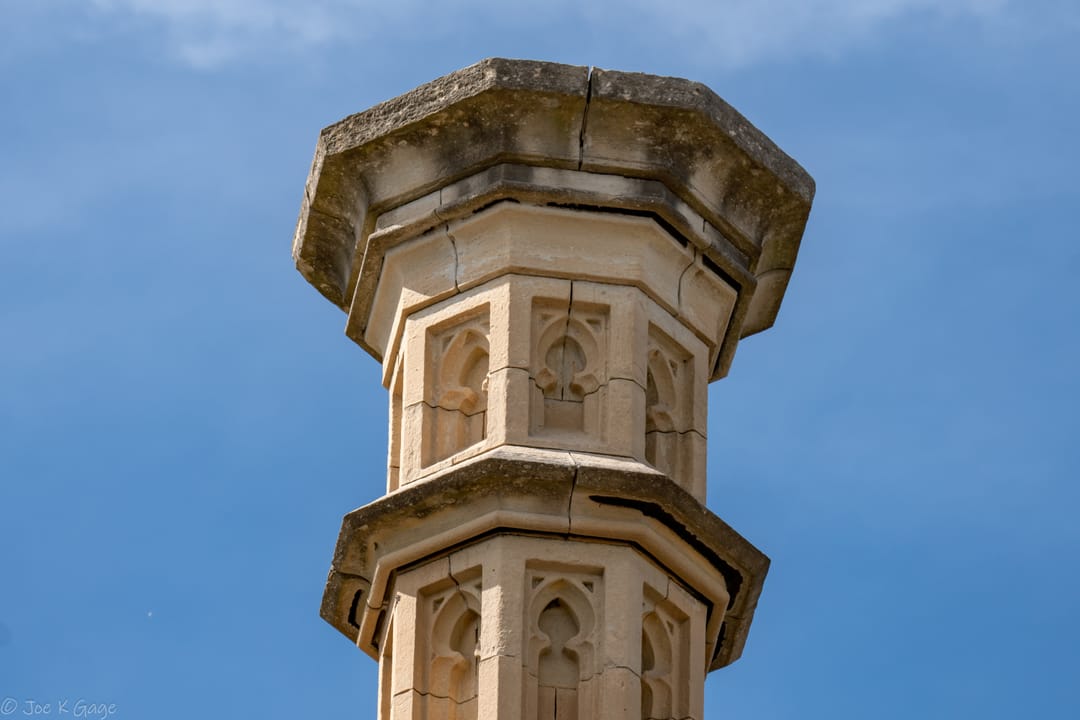 Close detail of one of Old Joliet Prison's octagonal corner turrets against the sky, Joliet, Illinois.