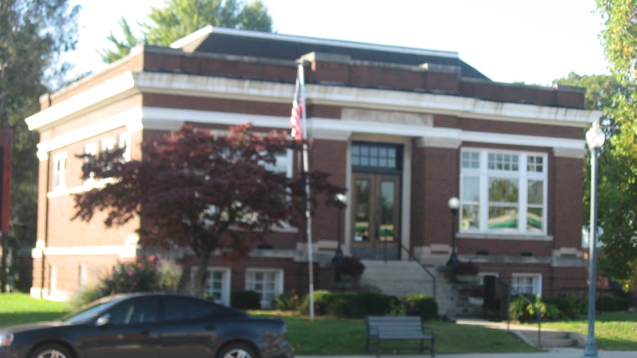 Front of the Knightstown Carnegie Library, located at 5 W. Main Street (U.S. Route 40) in Knightstown, Indiana, United States.  Built in 1912, it is part of the Knightstown Historic District, a historic district that is listed on the National Register of Historic Places.