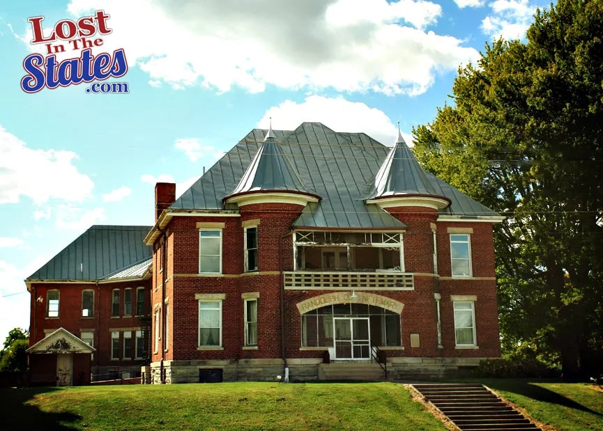 Randolph County Infirmary, Winchester, Indiana — 1899 brick institutional building with twin witch's hat towers