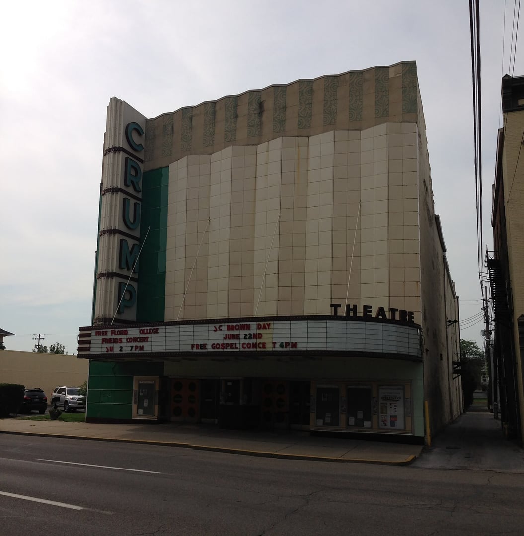 Exterior of the 1889 Crump Theatre on Third Street in downtown Columbus, Indiana, showing the Art Deco vitrolite facade and marquee