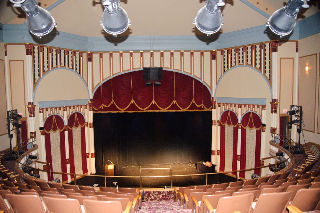 The stage and red velvet curtains of the Grand Opera House auditorium, seen from the balcony, Dubuque, Iowa, 2010.