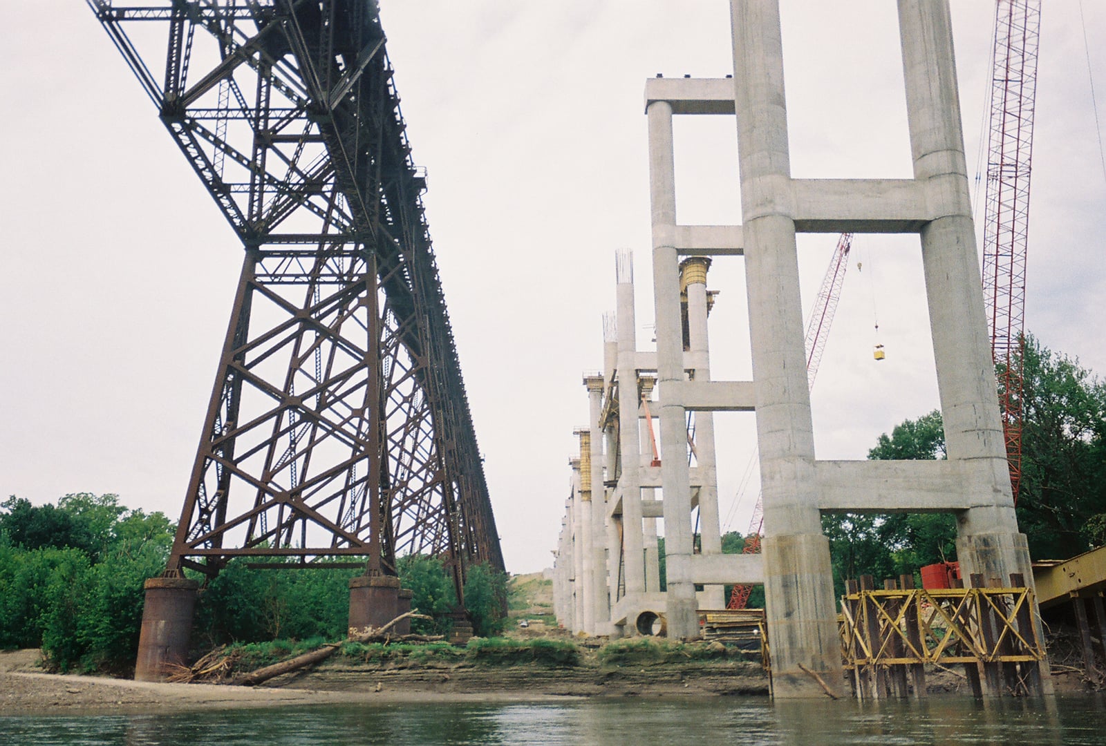 Kate Shelley High Bridge, currently owned by Union Pacific Railroad. The original steel trestle Boone Viaduct, a.k.a. Kate Shelley High Bridge, is on the left (south); the new officially named Kate Shelley High Bridge with reinforced concrete trestles is on the right (north). Photograph captured 08/