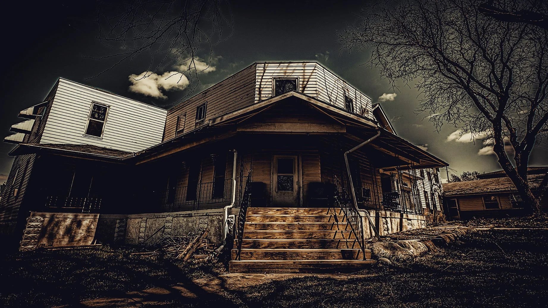 Exterior of Malvern Manor, a former residential care facility turned paranormal investigation venue at 401 E 2nd Street in Malvern, Iowa