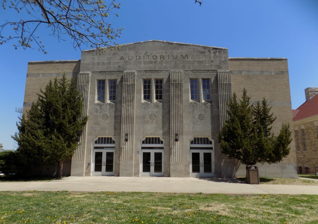 The Auditorium, located on the Haskell campus, which was built in 1933. Currently houses murals by Haskell alumnus Franklin Gritts (Cherokee), according to the school.
