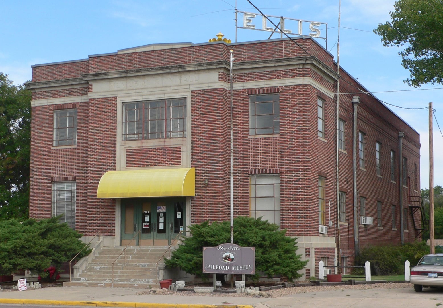 Southwest view of the Ellis Railroad Museum at 911 Washington Street in Ellis, Kansas, a National Register building formerly known as Memorial City Hall.