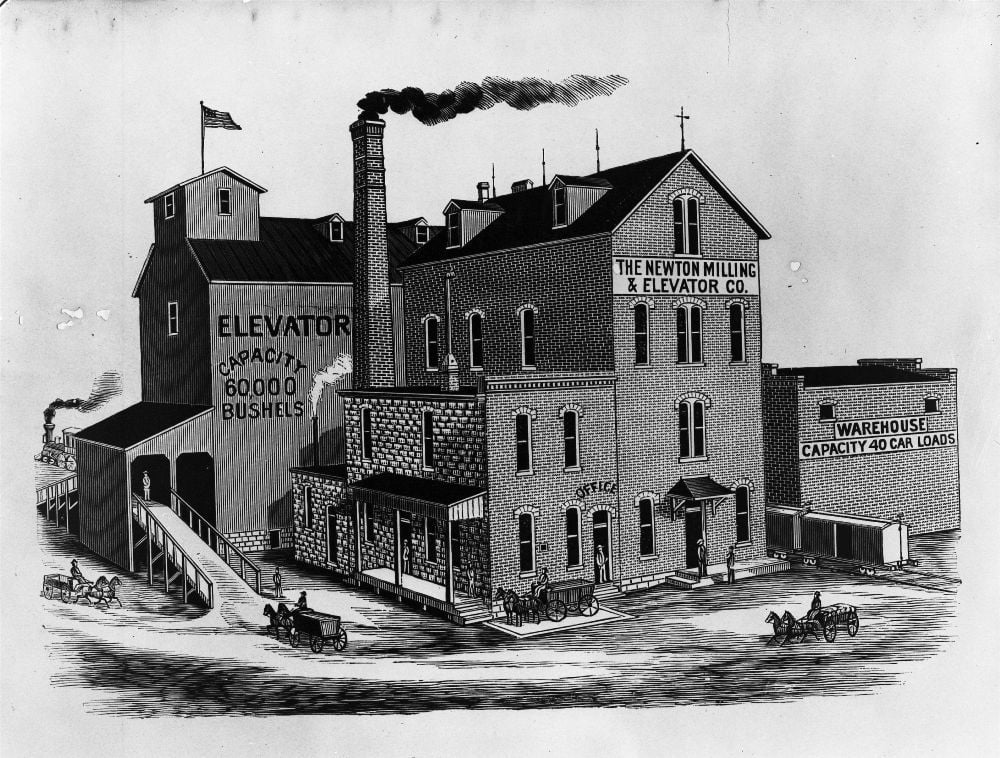 Historic 1890 photograph of the Warkentin Mill (Newton Milling and Elevator Company) at 301 North Main Street in Newton, Kansas — now operating as Old Mill Plaza