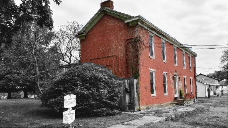 Ditto House Inn at 204 West Elm Street in West Point, Kentucky — Federal-style 1823 brick inn overlooking the Ohio River