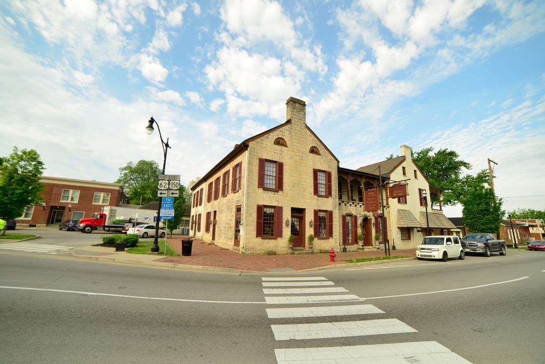 1819 limestone facade of Jailer's Inn Bed and Breakfast at 111 W Stephen Foster Ave, Bardstown, Kentucky