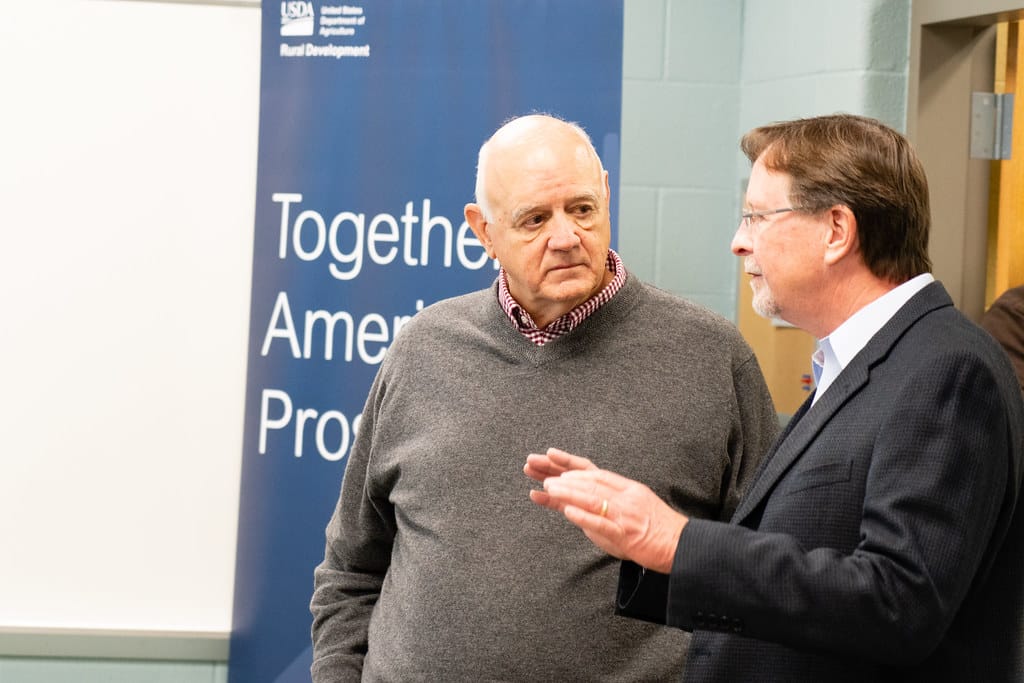 COLUMBIA, Ky. -- (Left) Bill Grigsby, president and chief executive officer of Thacker-Grigsby Telephone Company, and Randy Grogan, general manager and chief executive officer of Ballard Telephone Cooperative, speak before a formal announcement of over $55.3 million in ReConnect Pilot Program invest
