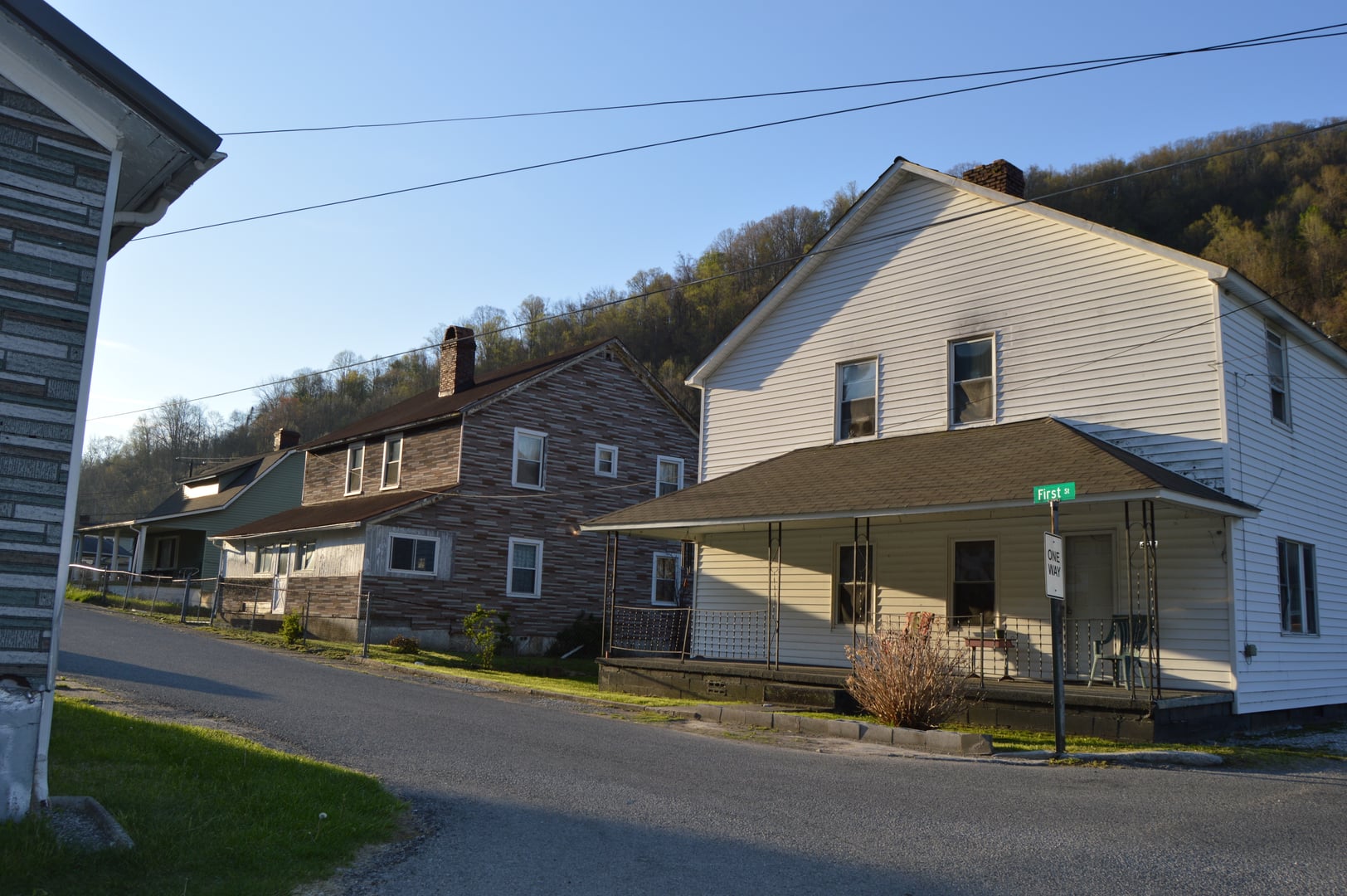 Houses at the western end of First Street, seen from Pirate Way, in Lynch, Kentucky, United States.  These houses are part of the Lynch Historic District, a historic district that is listed on the National Register of Historic Places.