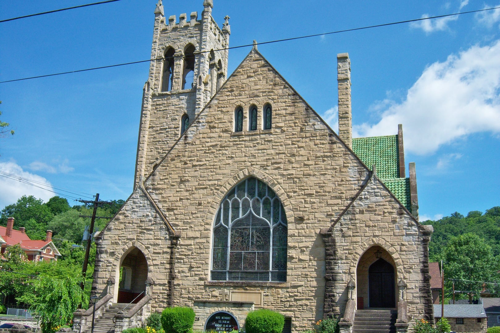 Sandstone facade of Mayo Memorial United Methodist Church in Paintsville, Kentucky, a 1909 Italianate church funded by coal magnate John C.C. Mayo with an Andrew Carnegie pipe organ.