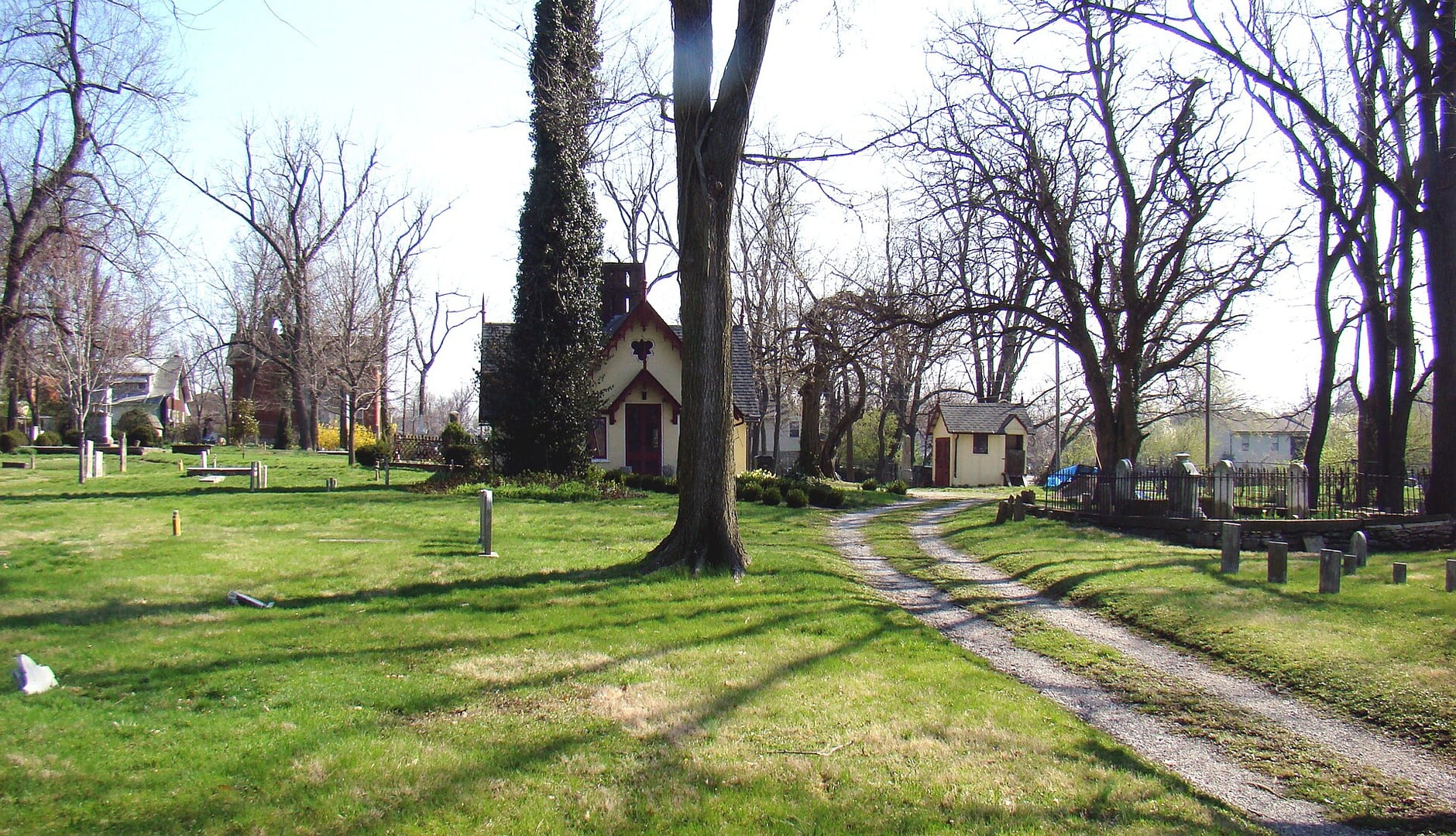 Old Episcopal Burying Ground with weathered 19th-century gravestones and the stone chapel on East Third Street, Lexington, Kentucky