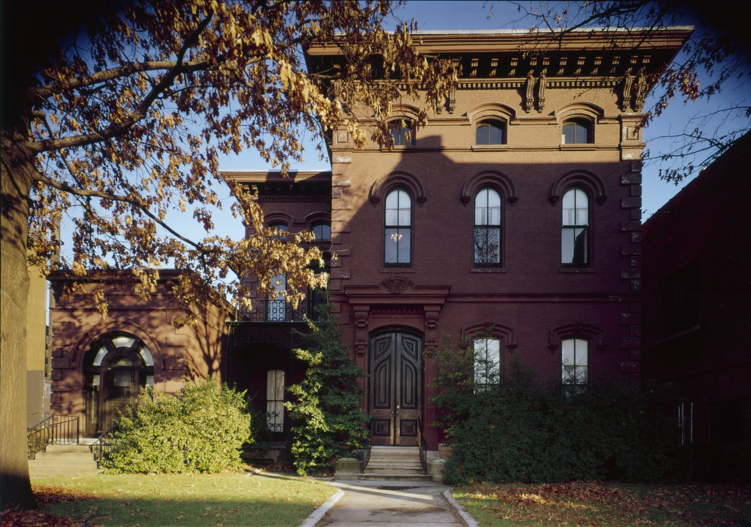 Italianate three-story townhouse facade of the Ronald-Brennan House on South Fifth Street in downtown Louisville