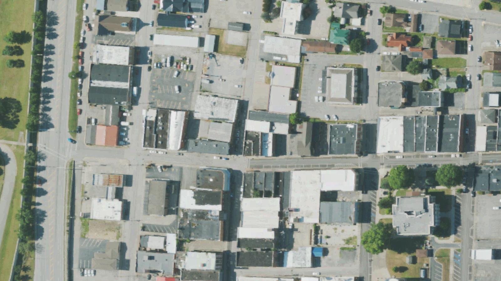 Aerial survey view of Sassy Trash (Former Hardware & Funeral Parlor)