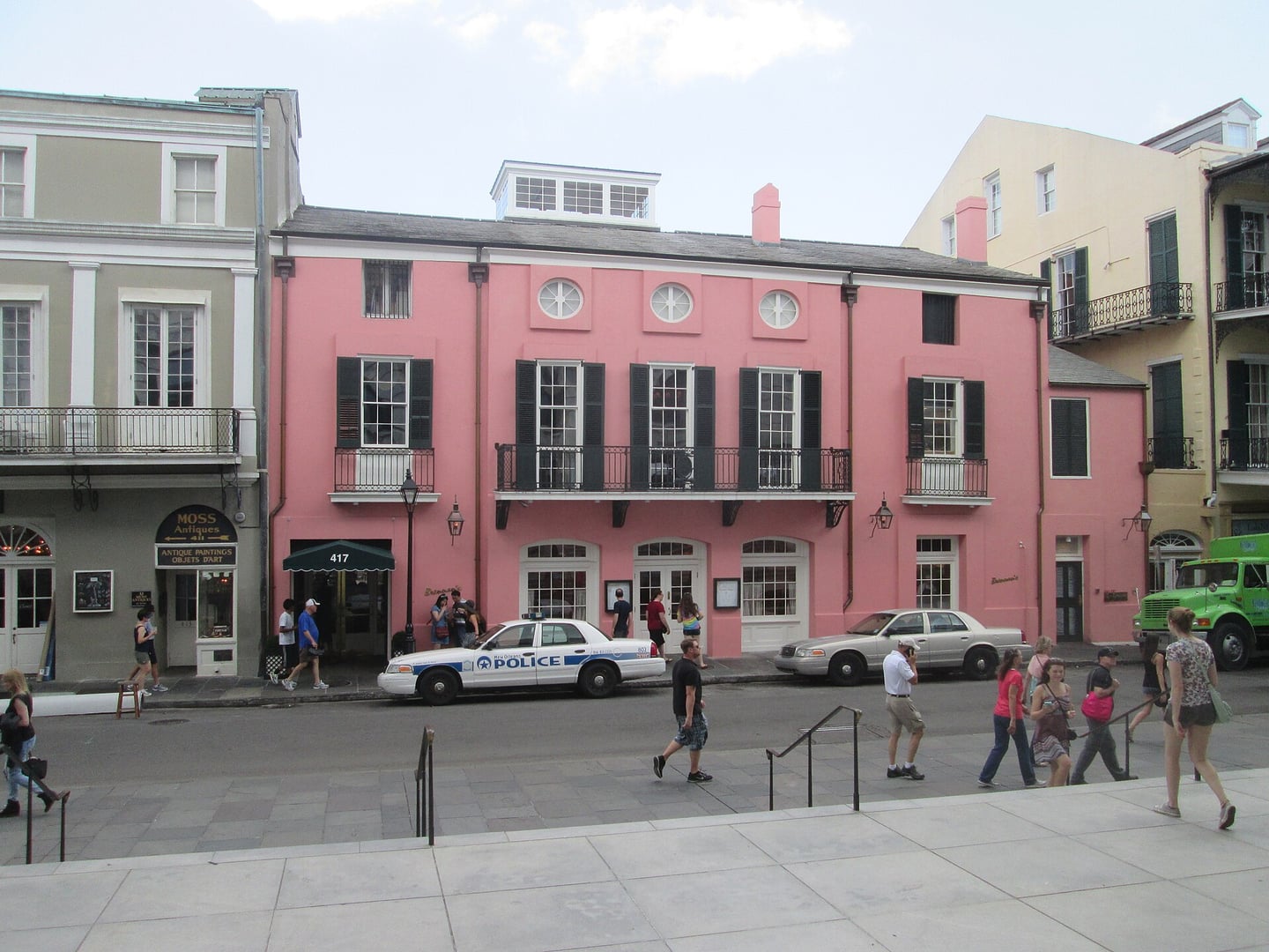 Pink-stuccoed exterior of Brennan's Restaurant at 417 Royal Street, an 1795 French Quarter mansion that became one of New Orleans' iconic Creole dining destinations