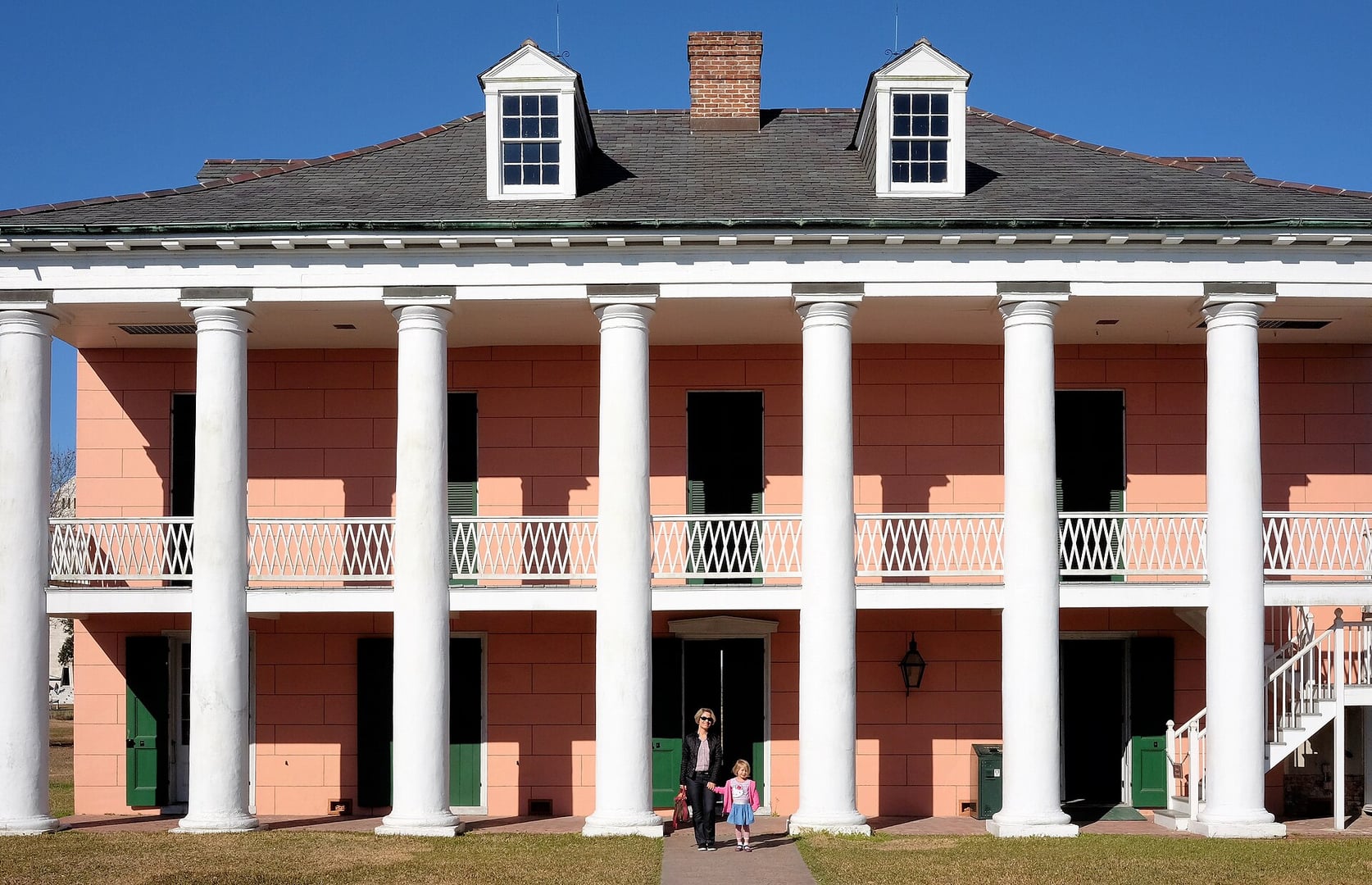 Exterior of the Malus-Beauregard House at Chalmette Battlefield, the 1832 Greek Revival plantation house overlooking the Battle of New Orleans site in Chalmette, Louisiana