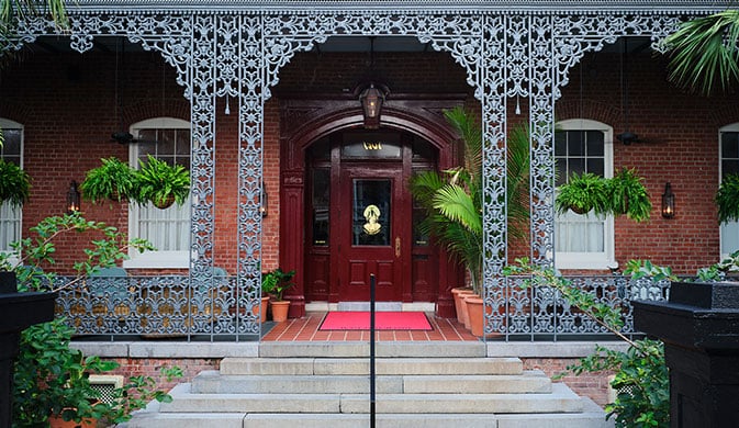 Red-brick front entrance of Hotel Saint Vincent at 1507 Magazine Street in New Orleans, formerly St. Vincent's Infant Asylum