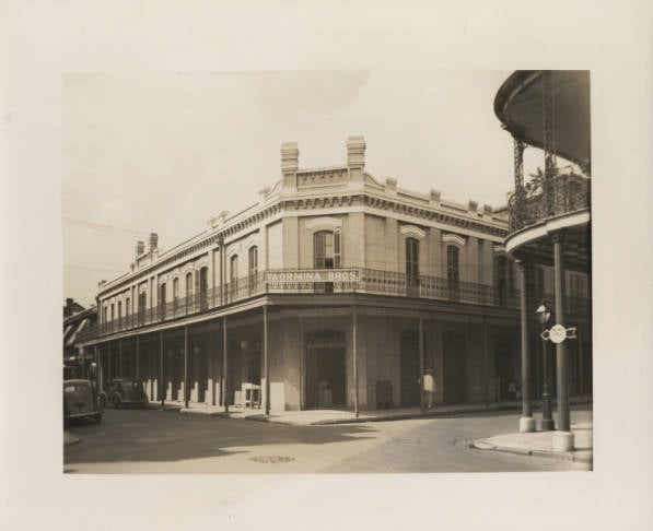 Historic exterior view of Muriel's Jackson Square, a Creole restaurant at 801 Chartres Street in the New Orleans French Quarter.