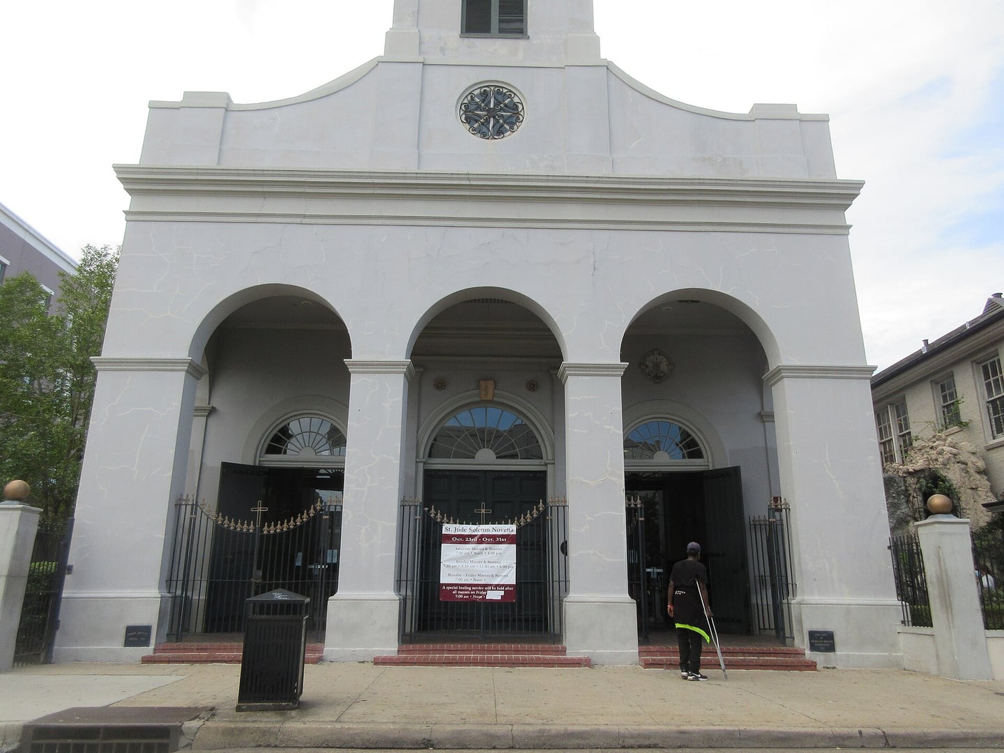 Stucco facade of Our Lady of Guadalupe Church (Old Mortuary Chapel), the oldest surviving church in New Orleans, on North Rampart Street