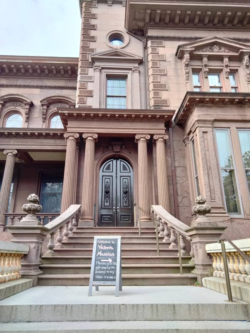 Italianate brownstone facade of Victoria Mansion at 109 Danforth Street in Portland, Maine