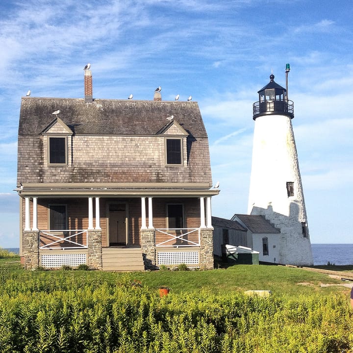 Close ground-level view of the keeper's house and light tower, Wood Island Light Station, Biddeford Pool, Maine, July 2014.