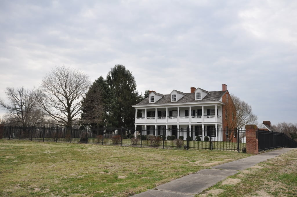 Federal-style Ballestone-Stansbury House at Rocky Point Park, Essex, Maryland, with white-pillared porch and red brick facade