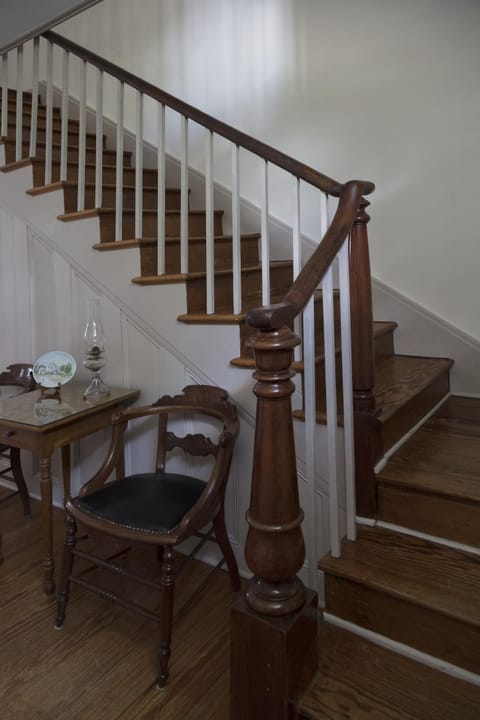 The original wooden staircase inside the Dr. Samuel A. Mudd House Museum, Waldorf, Maryland, 2017.
