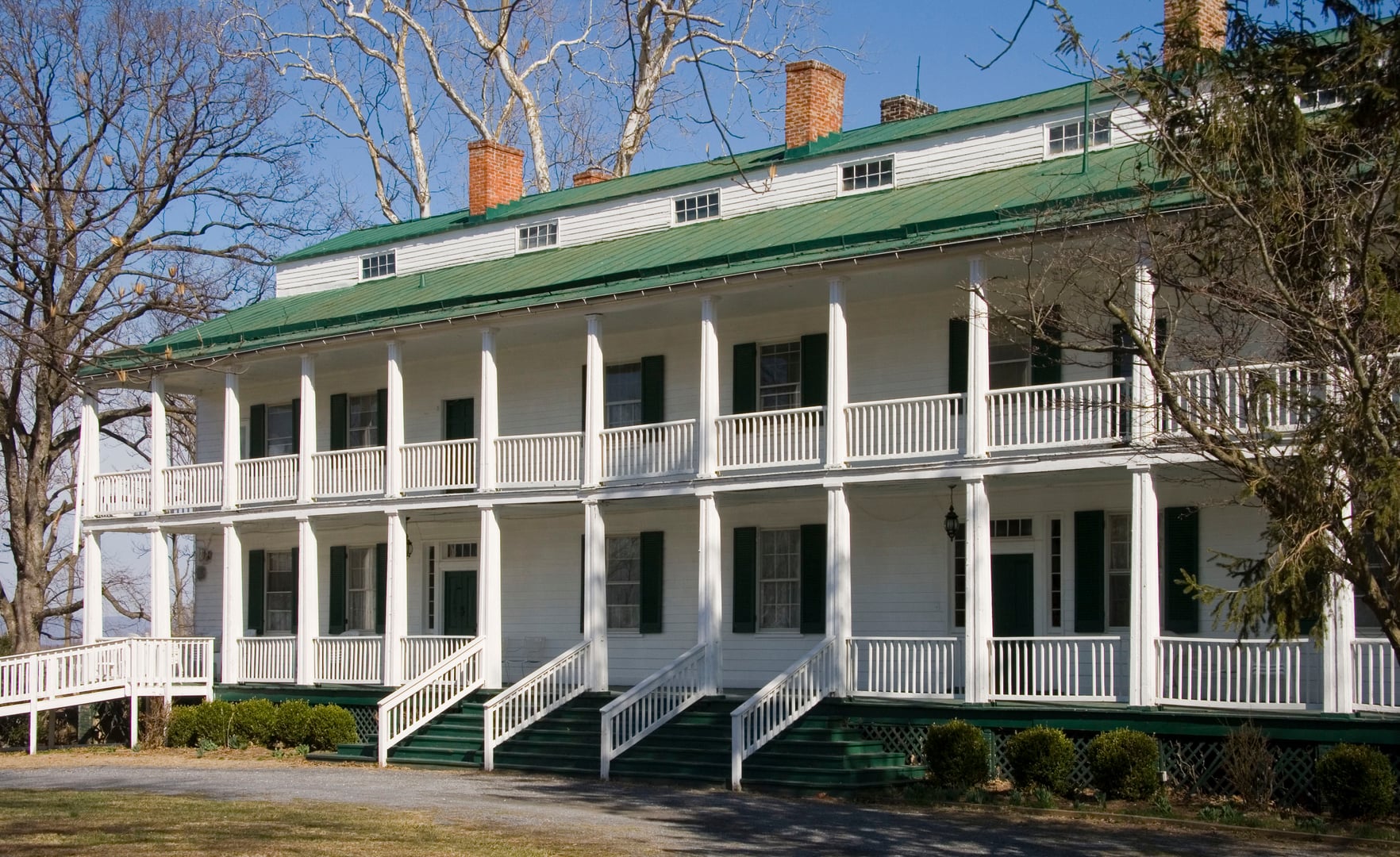 The Landon House (Stancioff House) in Urbana, Maryland — three-story frame mansion with clerestory roof and galleried porch, site of J.E.B. Stuart's 1862 Sabers and Roses Ball.