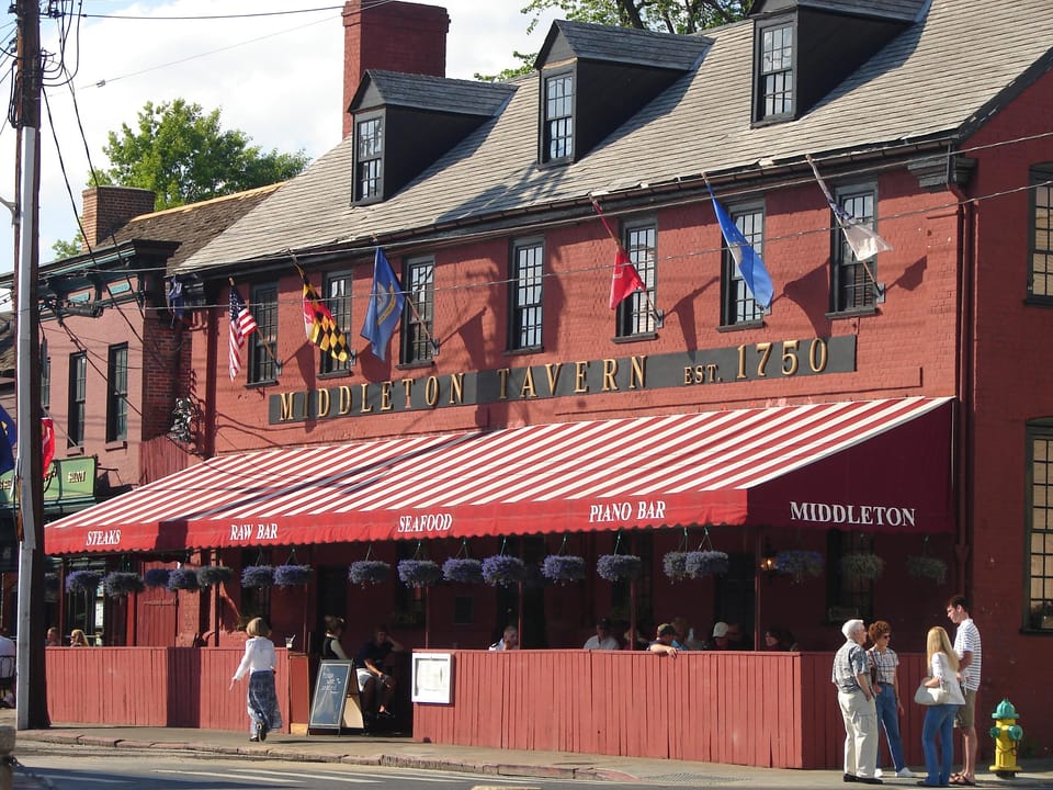 The three-story brick Georgian facade of Middleton Tavern in the Colonial Annapolis Historic District, Maryland