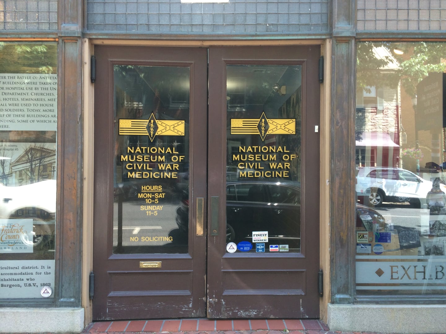 The brick storefront entrance to the National Museum of Civil War Medicine at 48 E Patrick Street in Frederick, Maryland