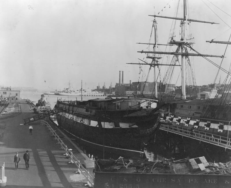 An official U.S. Navy photograph of USS Constellation moored alongside USS Constitution, 1948, before her move to Baltimore in 1955.