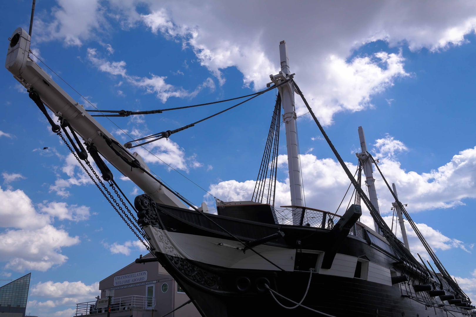 USS Constellation moored at Pier 1 in Baltimore's Inner Harbor, a tall-masted 1854 sloop-of-war