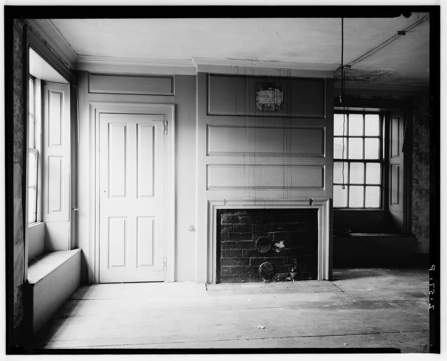 A second-floor room with its original paneled fireplace wall inside the Joshua Ward House, Salem, Massachusetts, photographed for the Historic American Buildings Survey, August 1937.