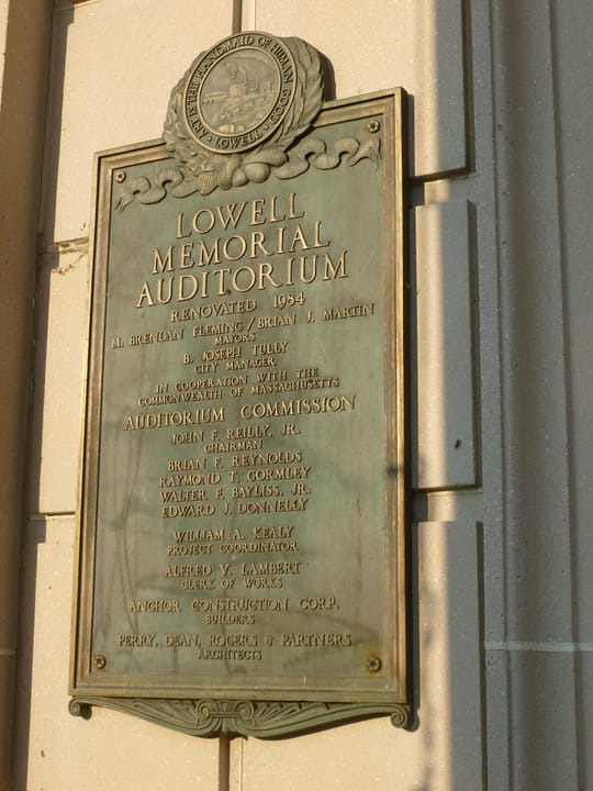 Lowell Memorial Auditorium historic stone building front and south facades in Lowell, Massachusetts