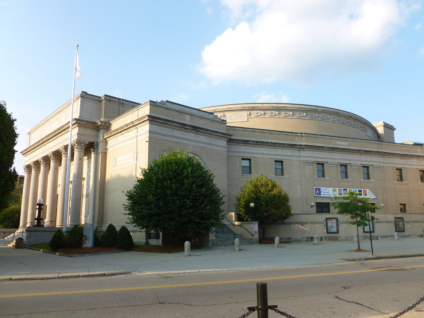 Lowell Memorial Auditorium historic stone building front and south facades in Lowell, Massachusetts