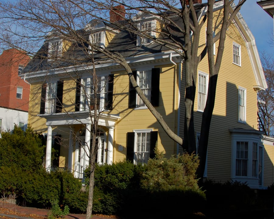 Three-story Federal brick facade of The Salem Inn's West House on Summer Street in Salem, Massachusetts