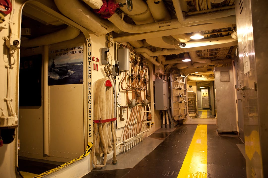 A main-deck passageway aboard the museum ship USS Salem, open to visitors.